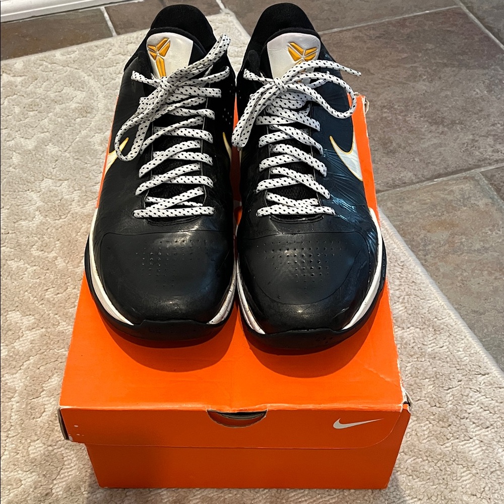 Nike Black and White Sneakers with Yellow Accents